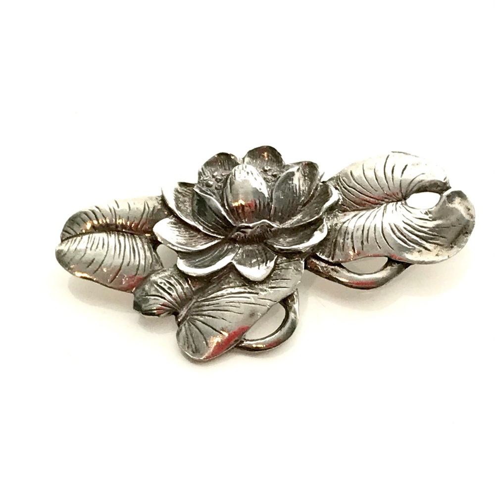 Elegant Silver Floral Brooch